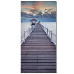 tableau pont en bois sur la mer