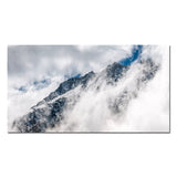 tableau sommet montagne rocher et nuages