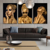 tableau femme noir en or