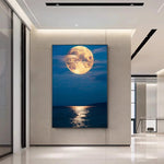 tableau lune orange et mer calme