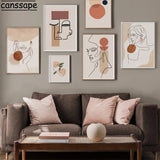 tableau rond marron et beige