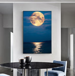 tableau lune orange et mer calme