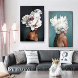 tableau femme tête fleurs blanches