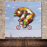 tableau ours coloré sur un vélo
