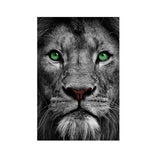 tableau lion yeux verts fond noir