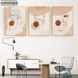 tableau rond marron et beige