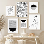 tableau rond noir et rayé