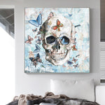 tableau peinture crâne et papillon